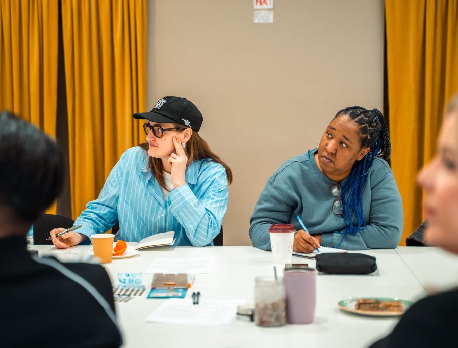 Two women at a YPAB meeting